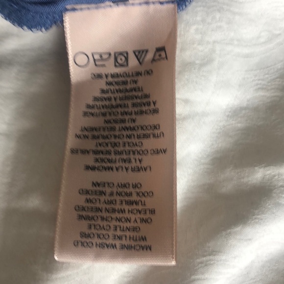 T shirt with cris cross on front. New!! - Picture 9 of 10